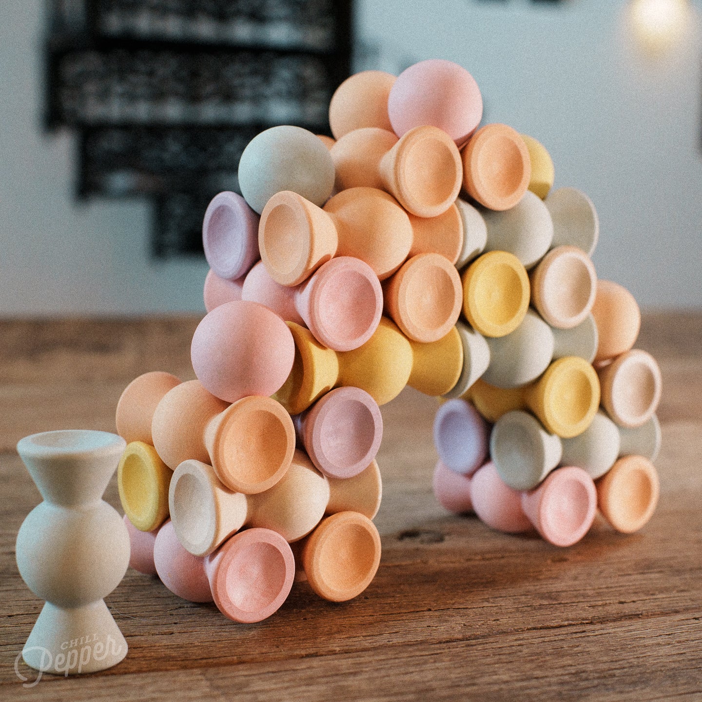 A bridge built with interlocking wooden Chill Pepper Sweets. A sustainable and made in Europe stacking game for open ended play