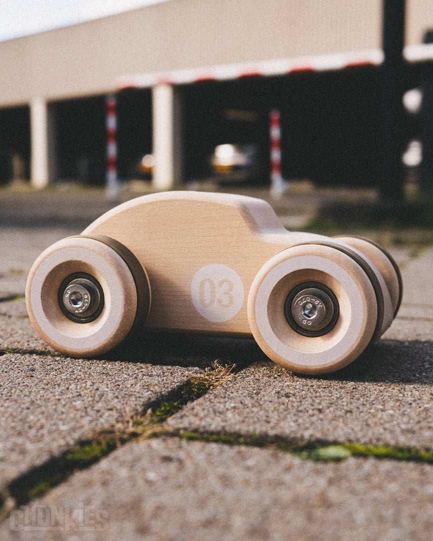 This little bug feels at home anywhere. Here we show the Chunkies wooden toy car named The Bug in natural European maple wood. Dutch Design. Made in Germany. Created for free imaginative play